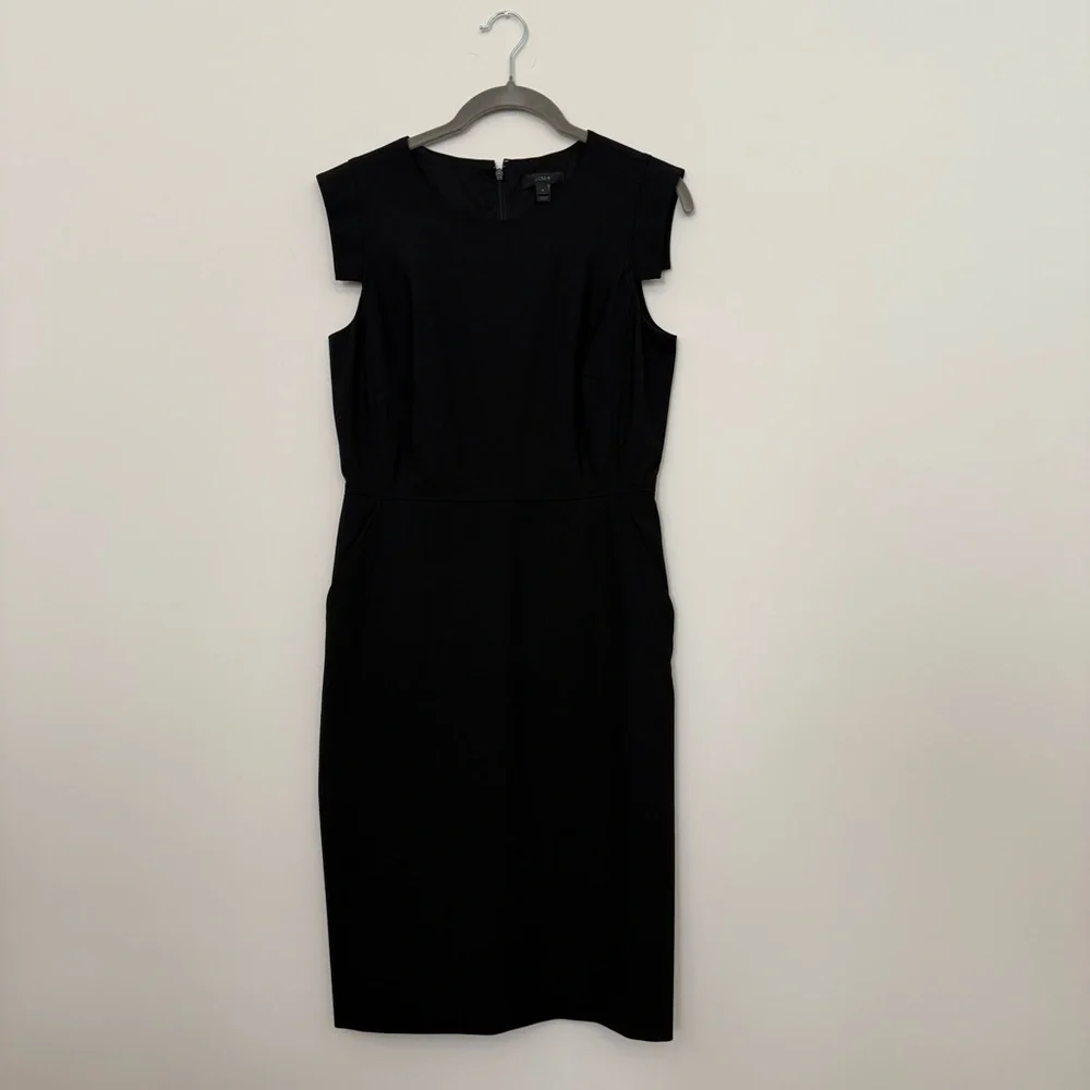 J. Crew Elegant Black Resume Dress. Pockets, back vent and zipper. Sleeveless.